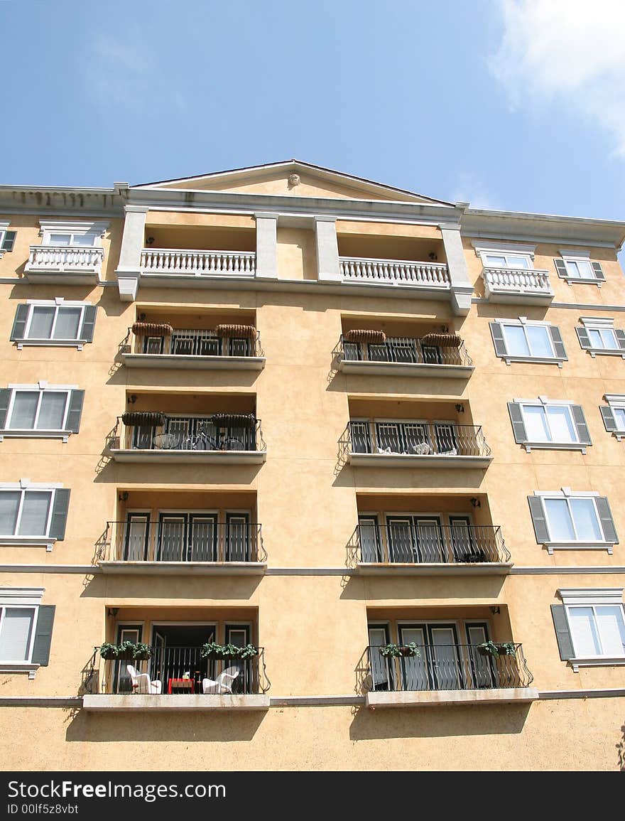 Pink Stucco Balconies