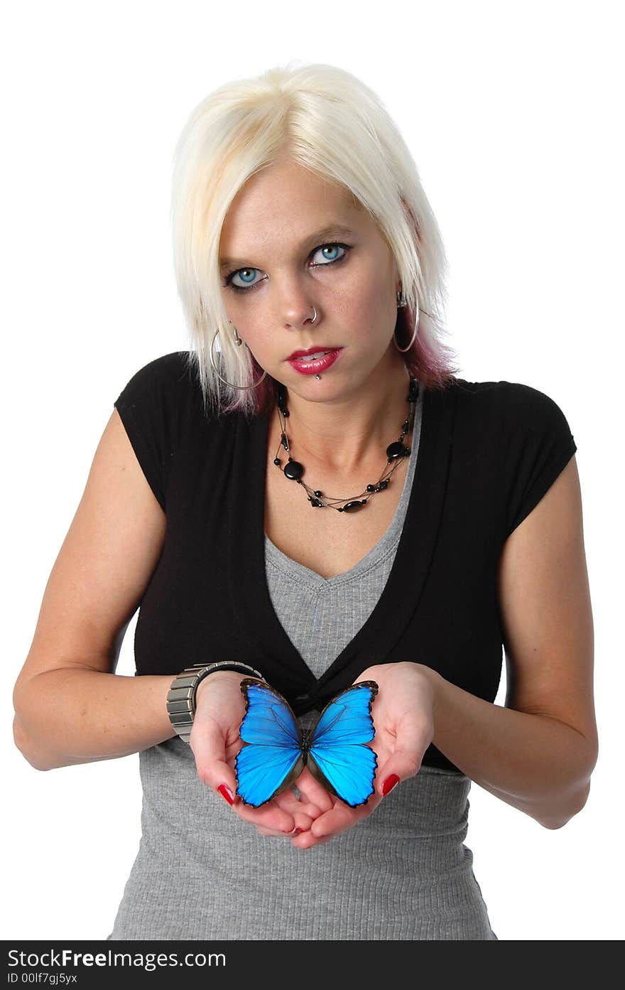 Beautiful blonde holding a blue butterfly