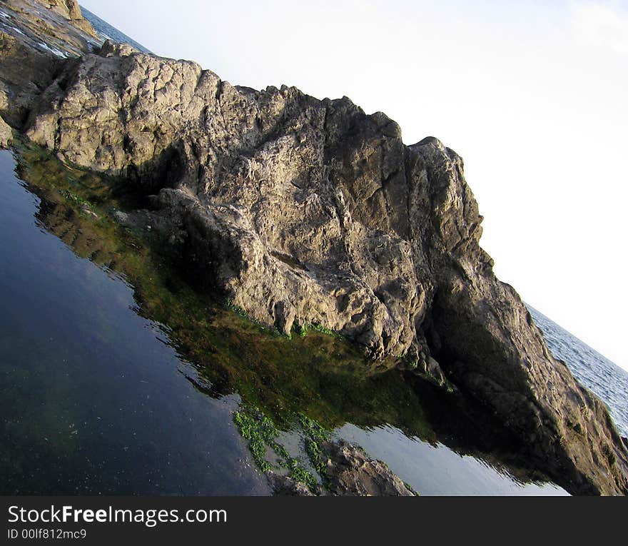 Ocean island with mini lake and mountain