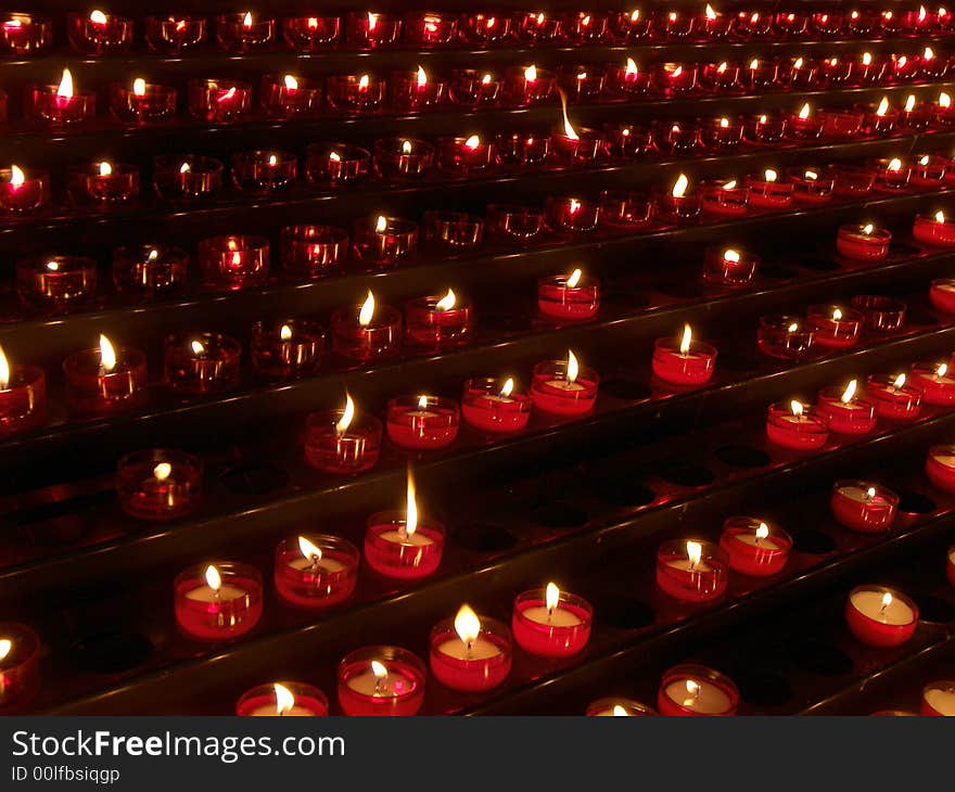 Rows of candles in church. Rows of candles in church