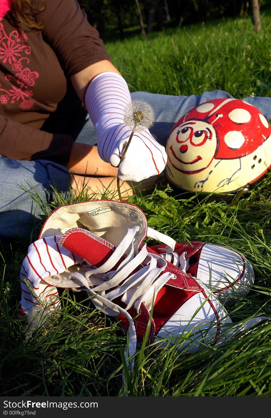 Shoes And Helmet On Grass