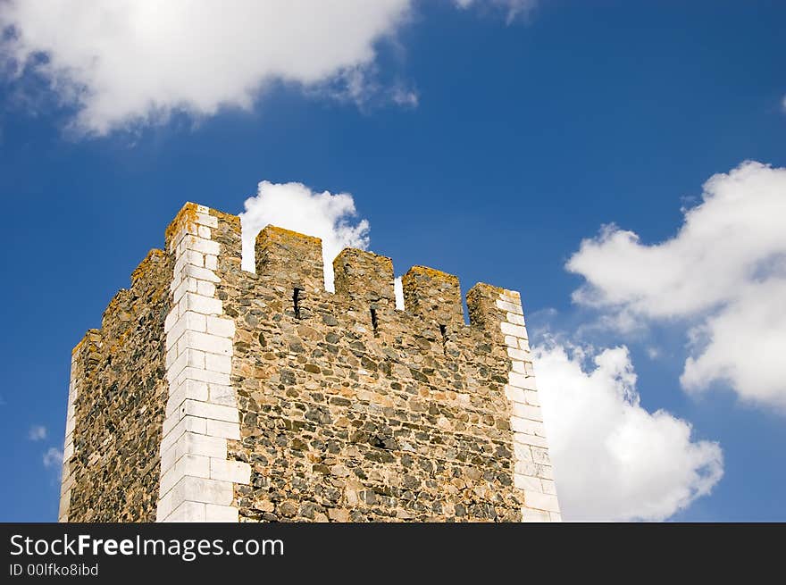 Castle tower under a beautiful blue sky