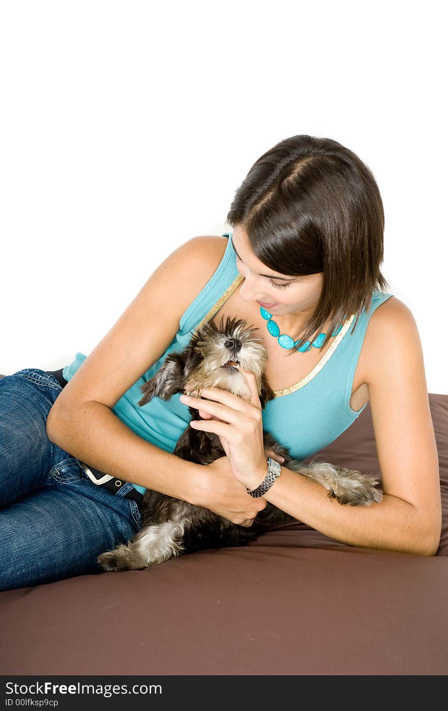 Cute owner playing with her puppy. Cute owner playing with her puppy