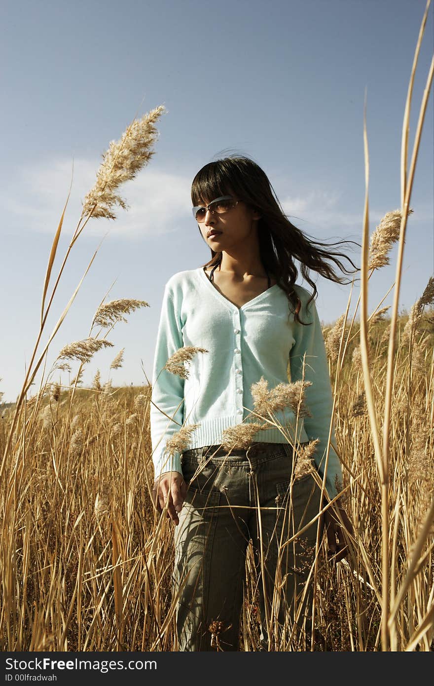 A chinese girl in the field. A chinese girl in the field