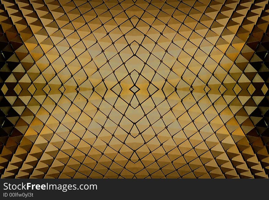 Abstract created from some elements of the Singapore Esplanade Theater roof when it is glowing bronze and yellow in the setting sun. Abstract created from some elements of the Singapore Esplanade Theater roof when it is glowing bronze and yellow in the setting sun