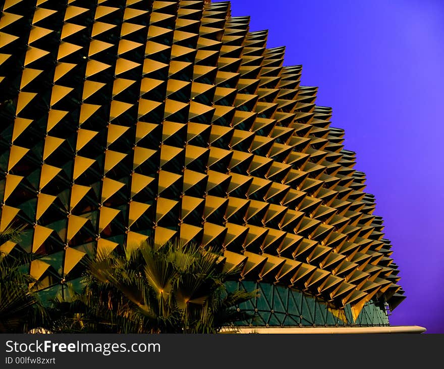 Captured at sunset as its spikes reflect the warm golden glow of the last rays of the sun; isolated from the sky and background, and replaced with a blue/purple gradient. Captured at sunset as its spikes reflect the warm golden glow of the last rays of the sun; isolated from the sky and background, and replaced with a blue/purple gradient.