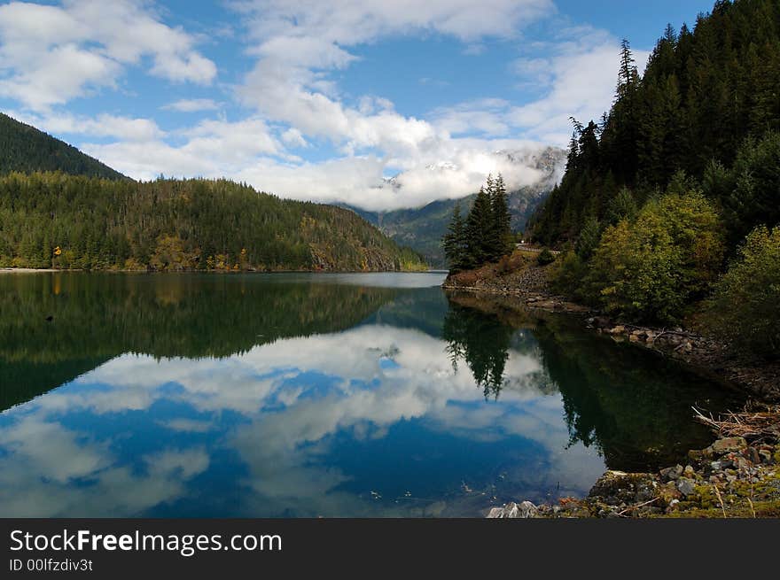 Reflection of Cascade Mountain Peak in the lake. Reflection of Cascade Mountain Peak in the lake