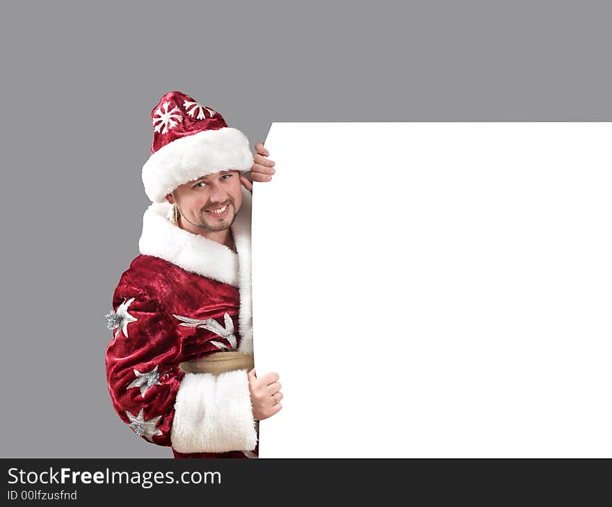 Santa Claus carrying a shield for advertisement. Santa Claus carrying a shield for advertisement