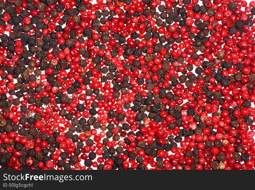 Close-up of dried black and red peppercorns