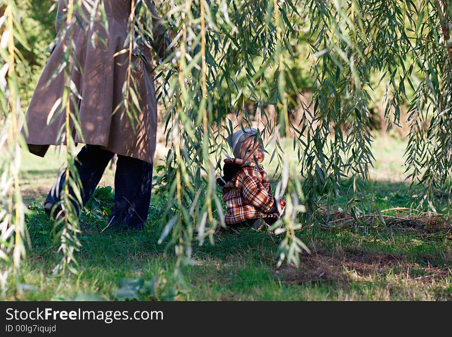 Little boy and his mother in park. Little boy and his mother in park