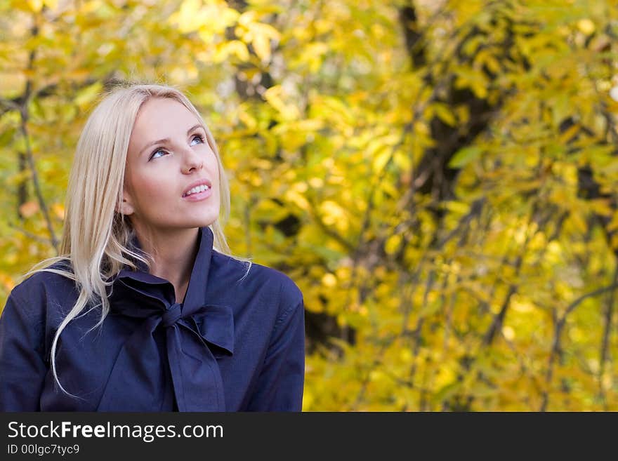 Beauty young woman in park. Beauty young woman in park