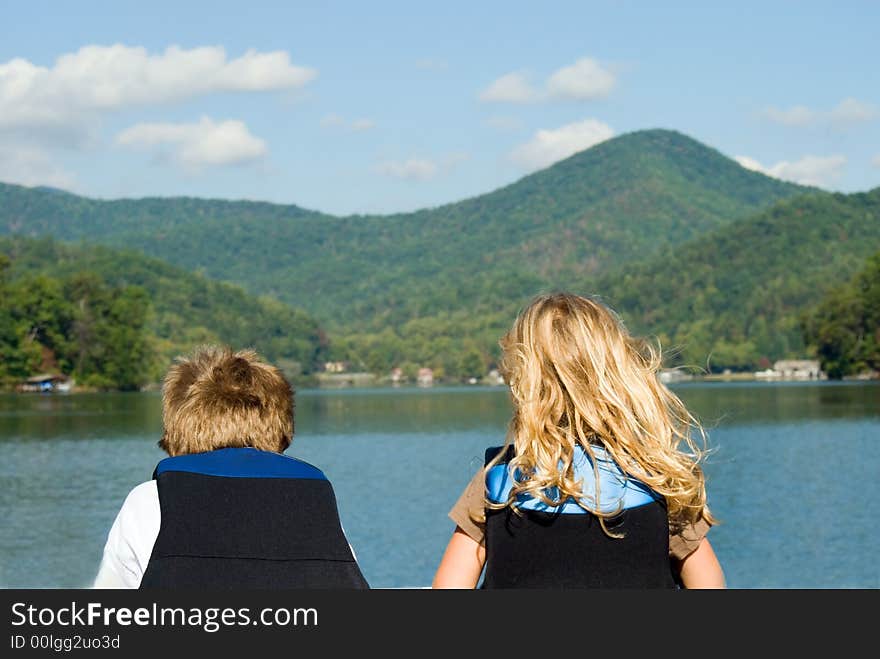 Boy and Girl Looking at Lake