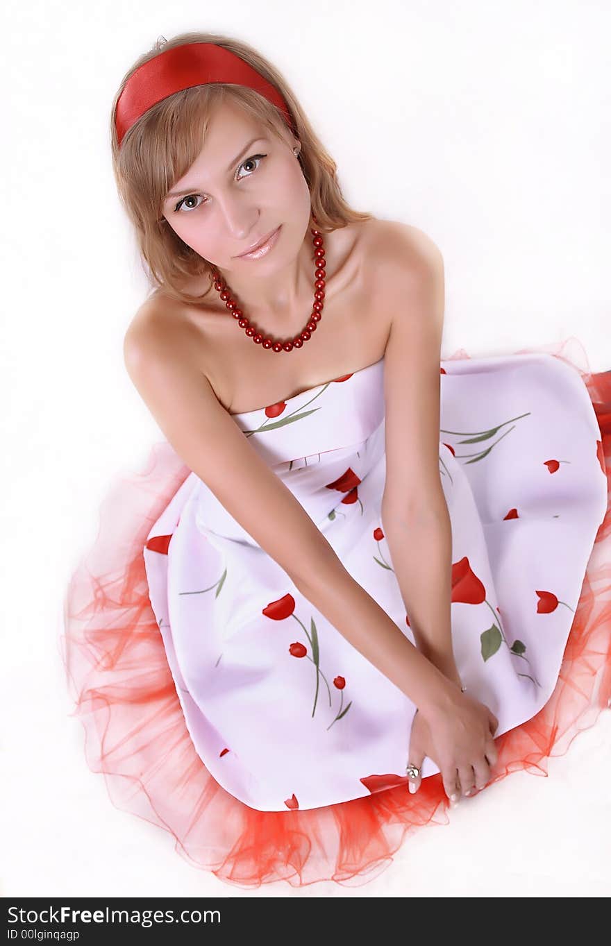 Sexy model in white dress with red. Isolated