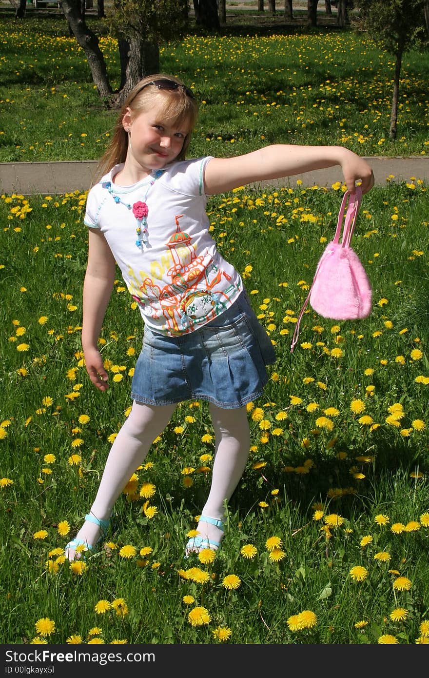 Young girl with pink bag