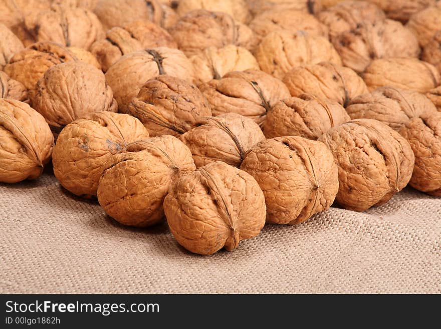 Walnuts on linen canvas