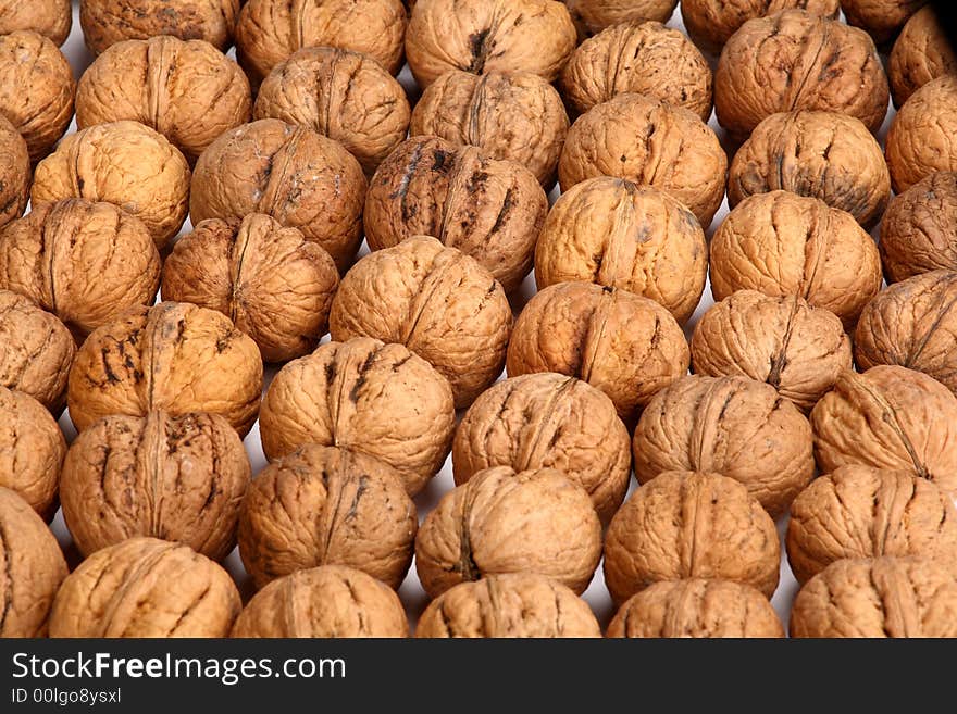 Walnuts background. not just nuts- like crowd or soldiers.