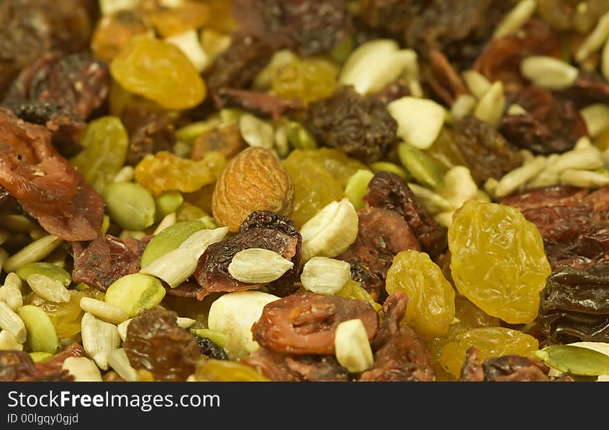 Healthy snack mix, nuts, seeds and dried berries. Background.