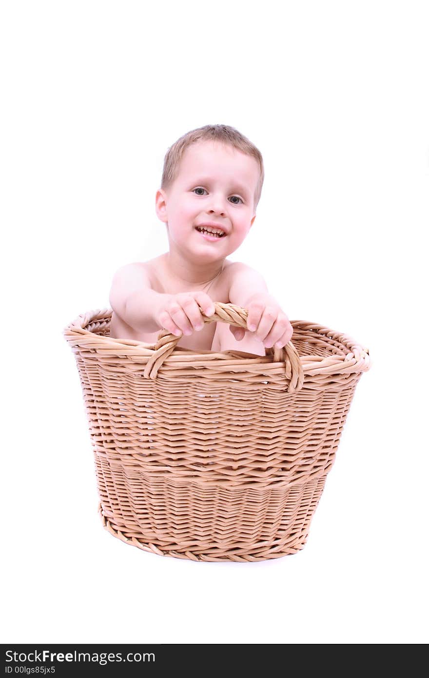 Boy in the basket on the white background