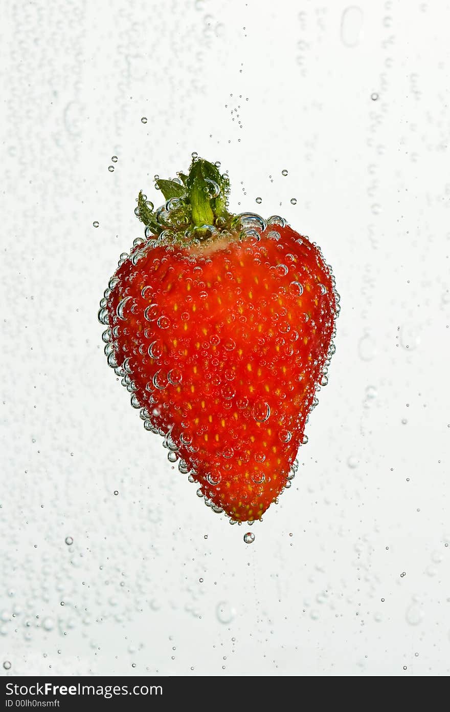 Fresh, clean apple in clear, bubbly liquid. Fresh, clean apple in clear, bubbly liquid.