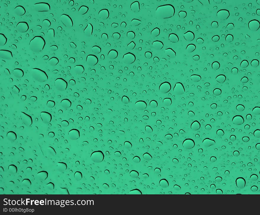 Abstract background with drops of water in a green glass. Abstract background with drops of water in a green glass