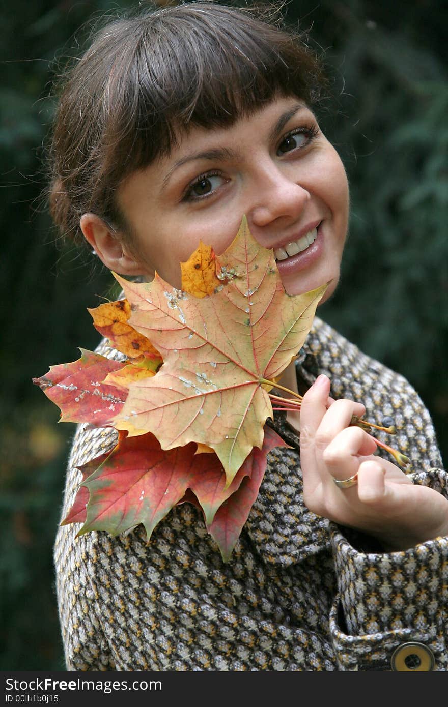 Beautiful woman walking in the autumn park. Beautiful woman walking in the autumn park