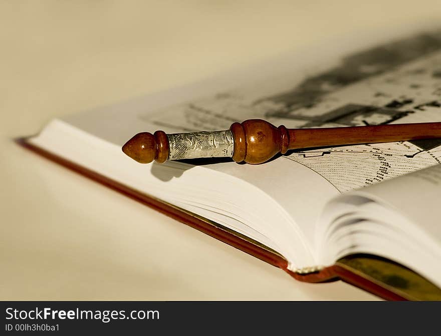 Travel Book with a wood object. Travel Book with a wood object