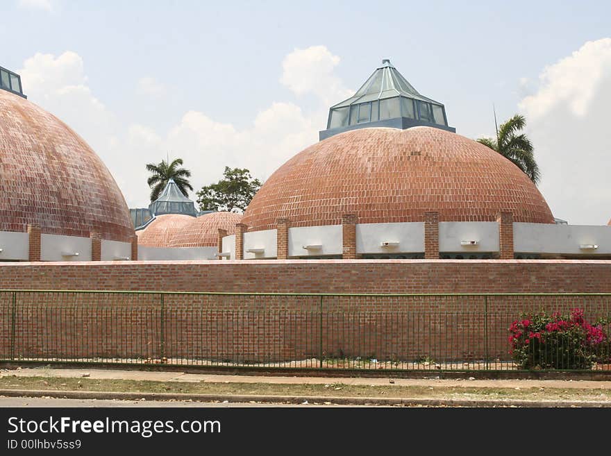 Domes of the buildings of the architectural group of the Superior Institute of Art in the city of Havana. One can observe that everything has been built with bricks and potteries manufactured with red clay.