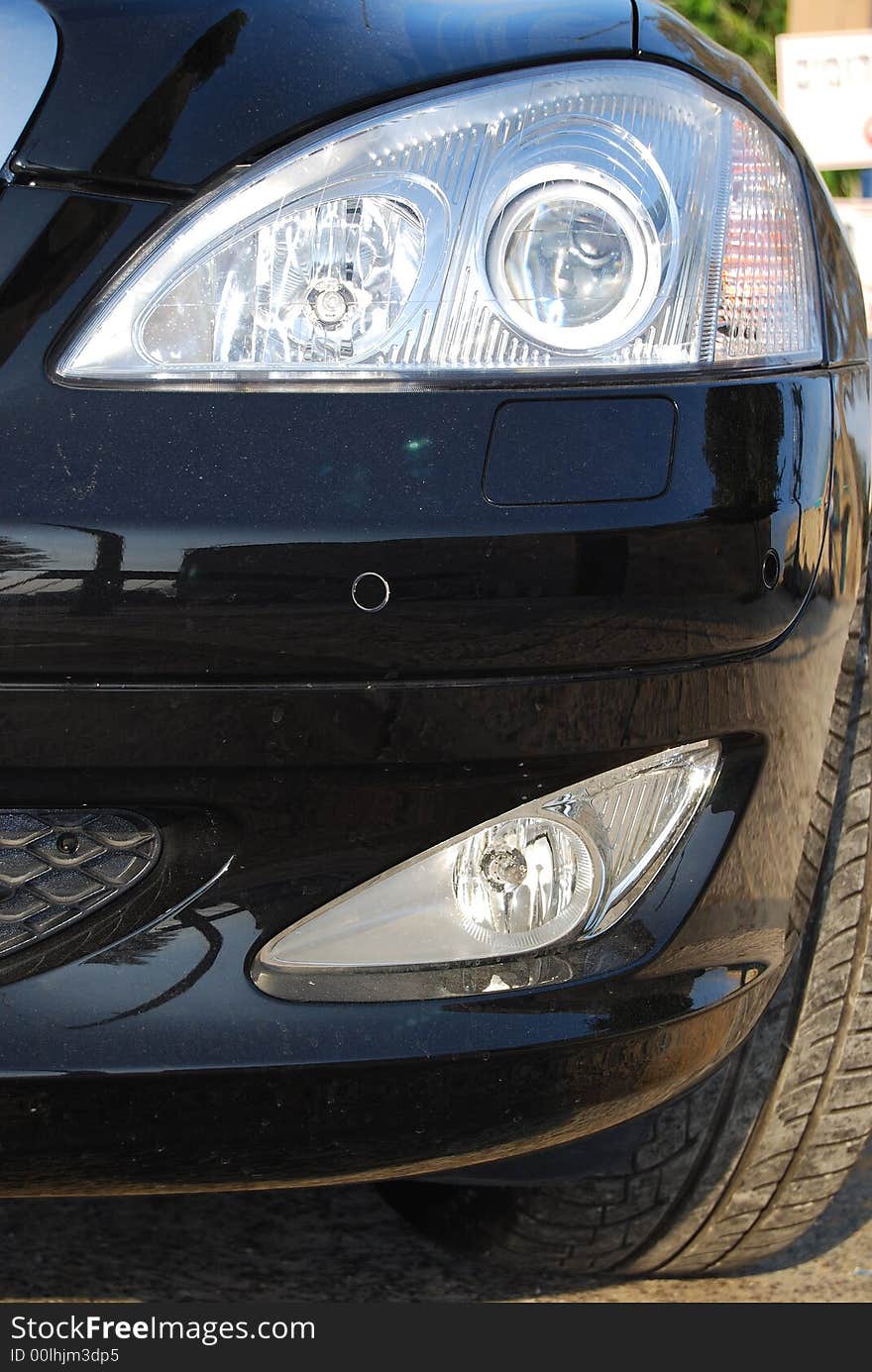 Close up of a car head light. Close up of a car head light