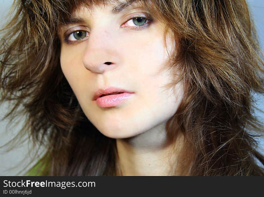 Portrait of a young woman looking in camera