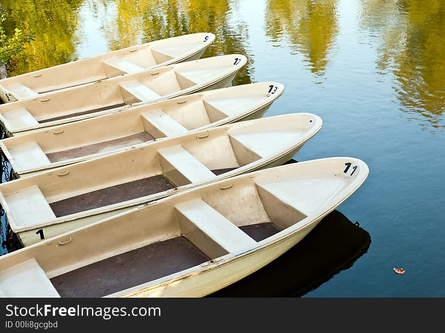 Boats on the lake.autumnal sky.