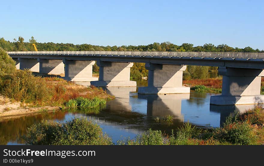 The bridge above river. In Ukraine.