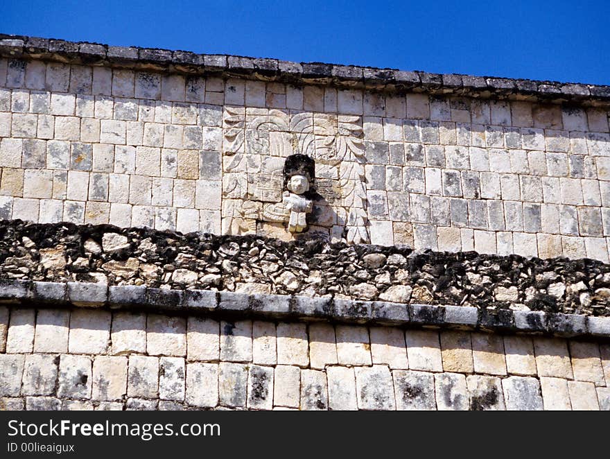 Stone carving on the wall in the Temple of the Warriors, Chichen Itza, Mexico. Stone carving on the wall in the Temple of the Warriors, Chichen Itza, Mexico