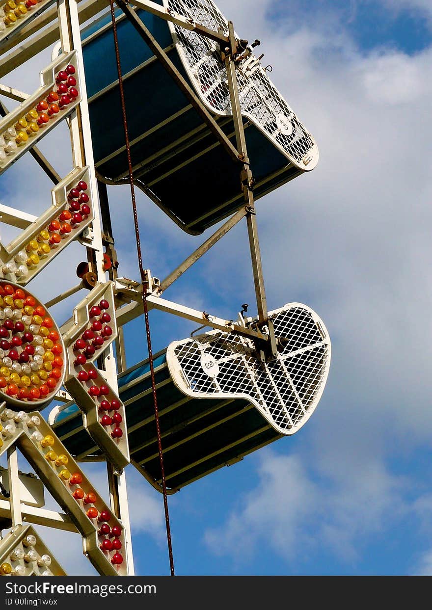 Abstract detail of carnival ride with brightly colored neon lights. Abstract detail of carnival ride with brightly colored neon lights