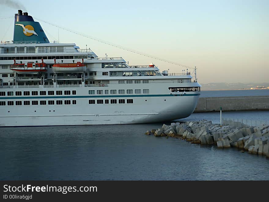 Passenger ship from Corsica arriving in the harbor of Nice at sunset. Passenger ship from Corsica arriving in the harbor of Nice at sunset