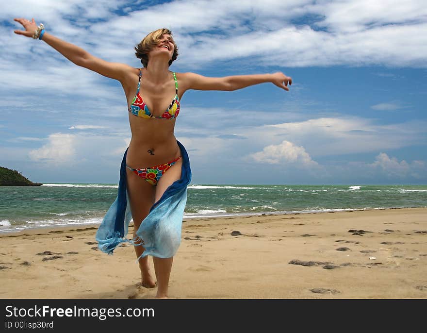 Young model at white sandy beach. Young model at white sandy beach