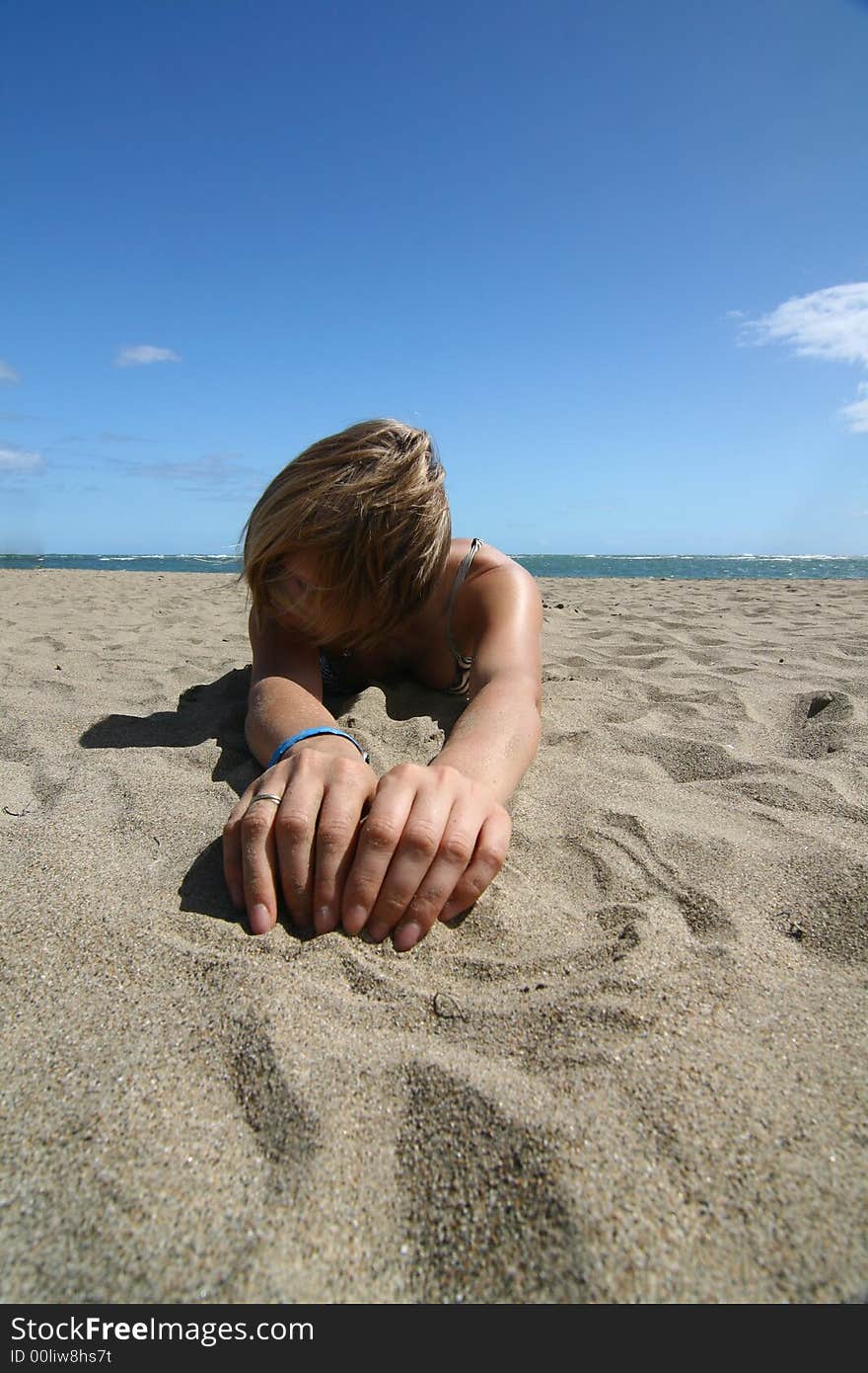 Young model at white sandy beach. Young model at white sandy beach