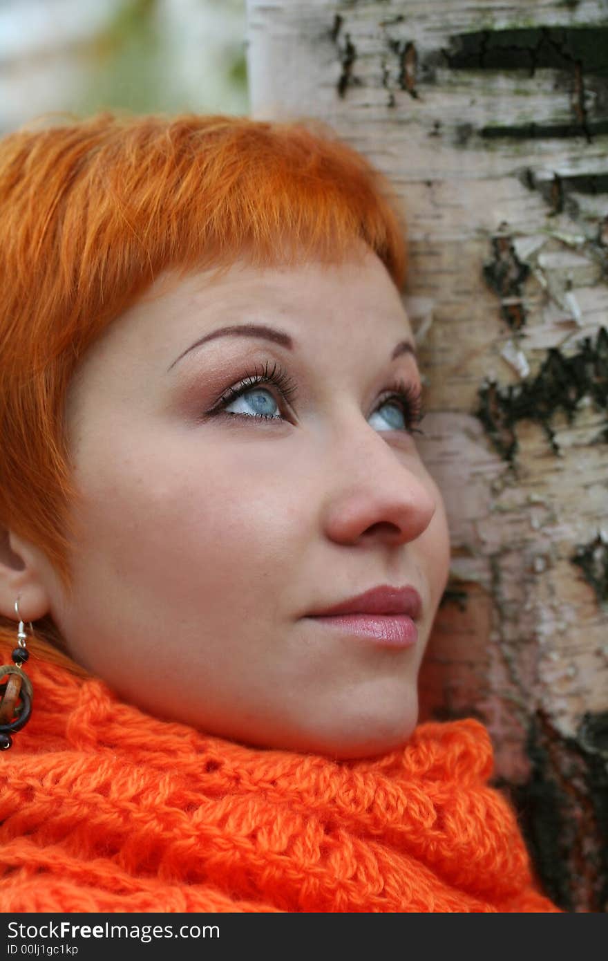 Young woman in red scarf