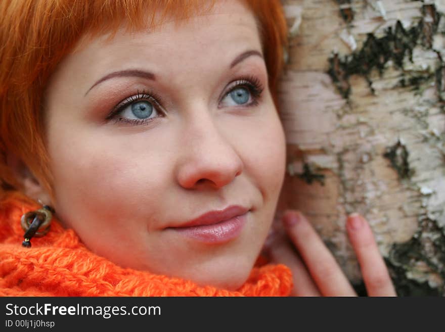 Young woman in red scarf