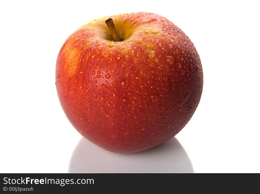 Isolated fresh and juicy apple with dewdrops. Isolated fresh and juicy apple with dewdrops