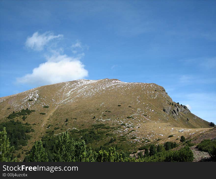 Mountains in nature with rocks grass and other plants. Mountains in nature with rocks grass and other plants