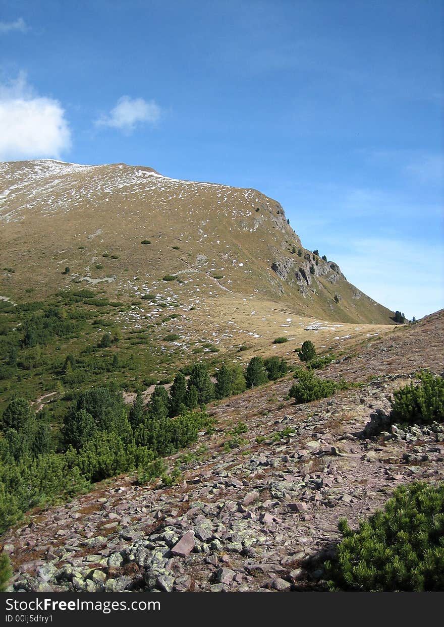 Mountains in nature with rocks grass and other plants. Mountains in nature with rocks grass and other plants