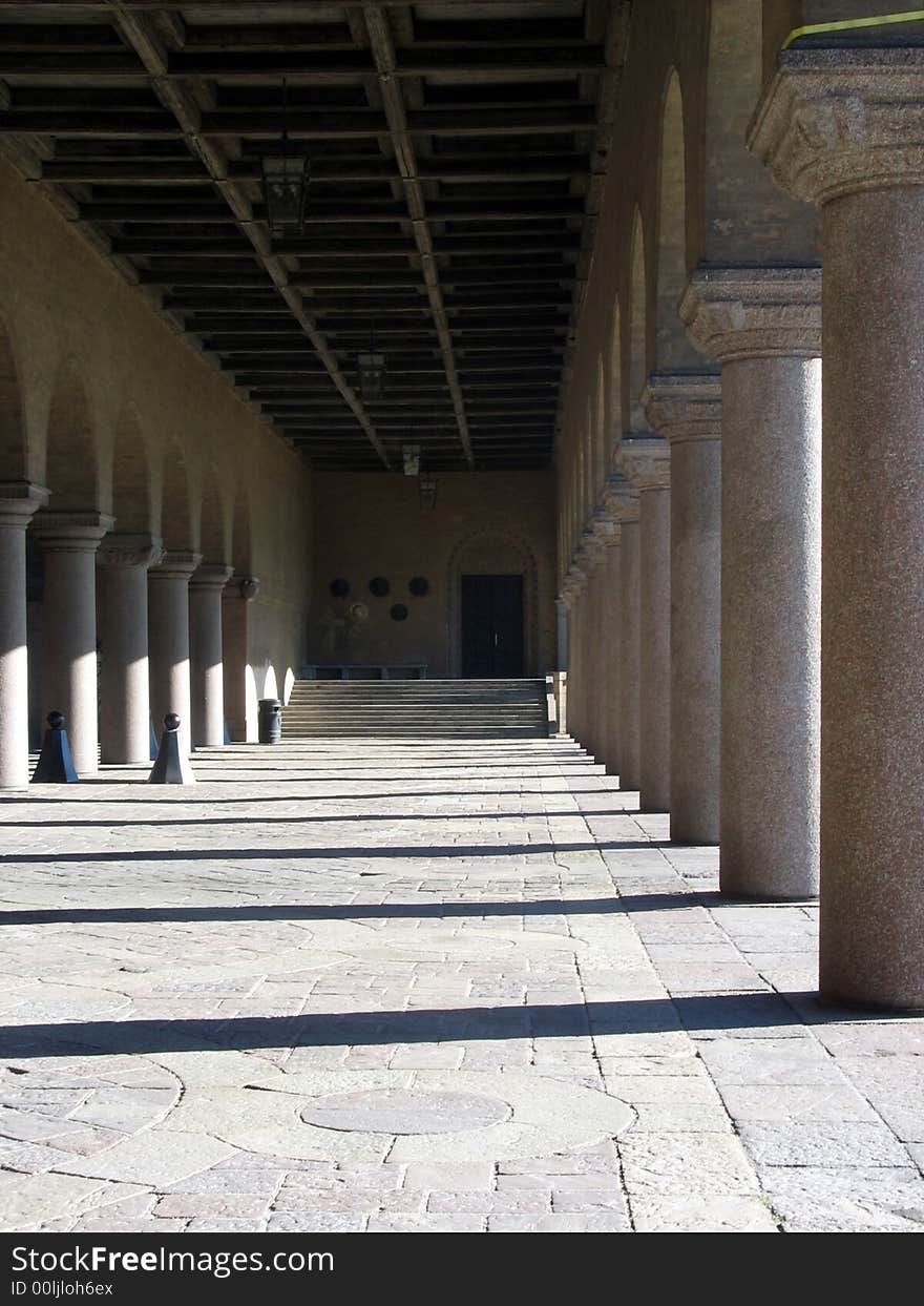 Pillars at an entrance to a giant beautiful building. Pillars at an entrance to a giant beautiful building