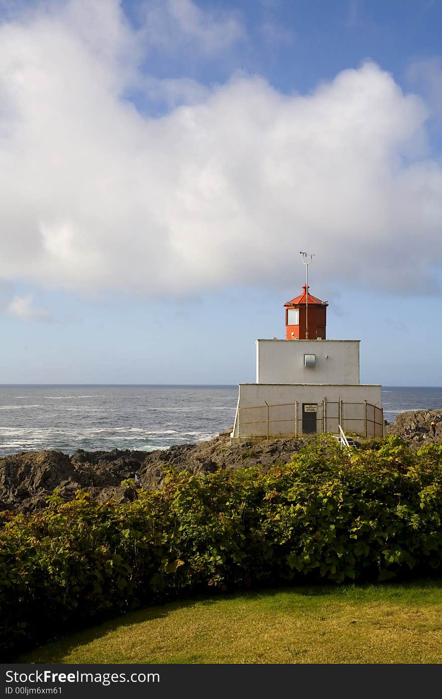 Light house over cloudy sky in Tofino canada