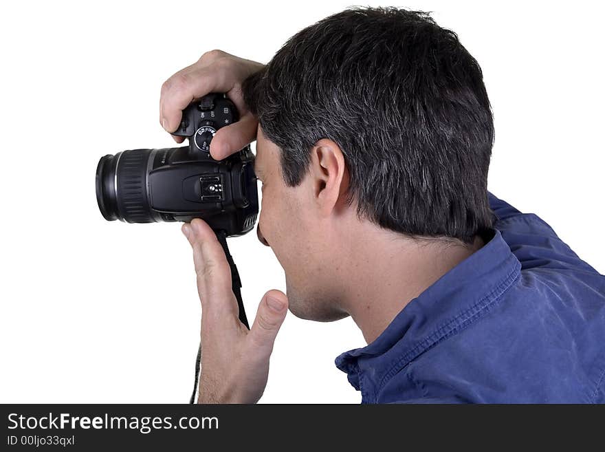 Man shot from profile taking picture with digital camera