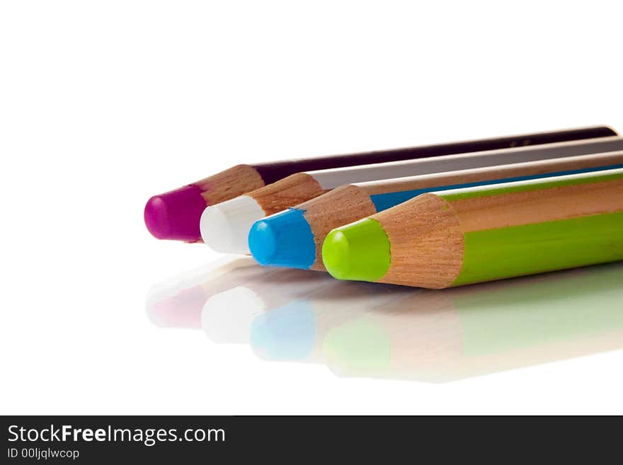 Four colorful wooden pencils isolated over white background. Four colorful wooden pencils isolated over white background