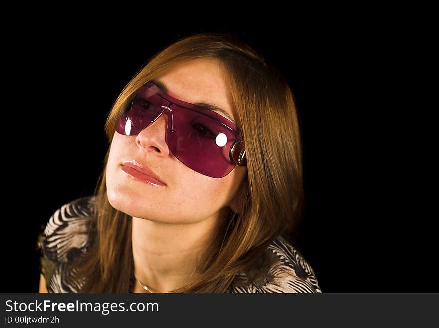 Woman close up portrait shot on black backdrop