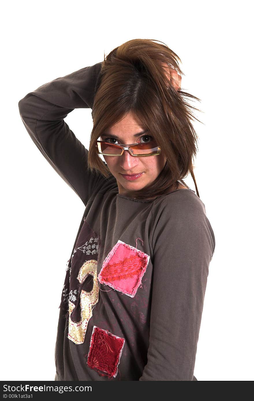 Woman with a fashion pose shot over white backdrop. Woman with a fashion pose shot over white backdrop