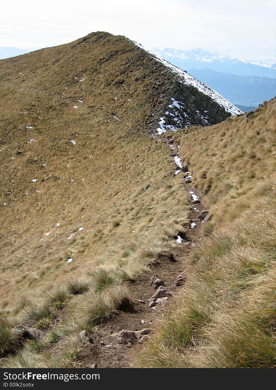 Mountains in nature with rocks grass and other plants. Mountains in nature with rocks grass and other plants