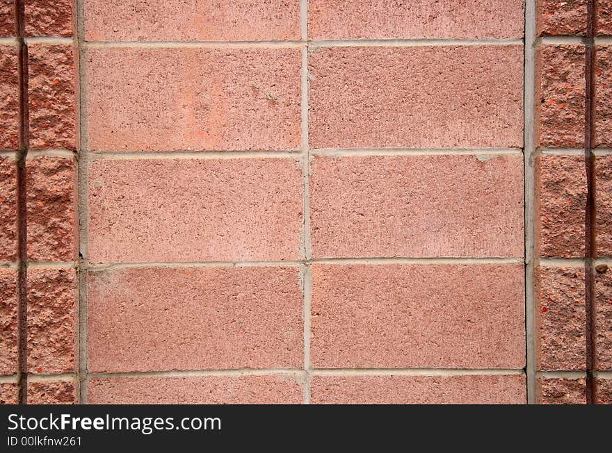 Close up of unique pattern on red cinder block wall. Close up of unique pattern on red cinder block wall.