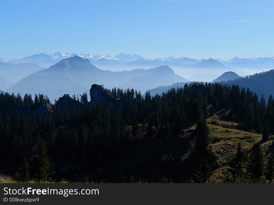 Alpes, Bavaria, Germany .
Sight from the Kampenwand Mountain ( Height 1665 m ).High Alpes in Austria  is in the distance.October 2007 . Alpes, Bavaria, Germany .
Sight from the Kampenwand Mountain ( Height 1665 m ).High Alpes in Austria  is in the distance.October 2007 .